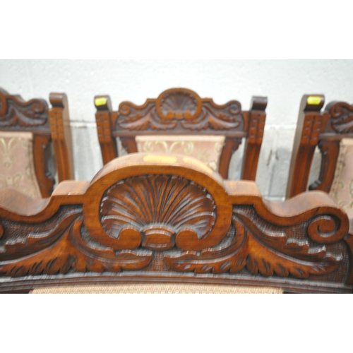 1260 - AN EDWARDIAN WALNUT PARLOUR SUITE, comprising a chaise lounge, length 175cm, an armchair, a large ch... 