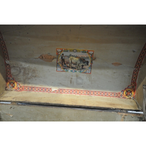 1284 - A SMALL DOMED TRUNK, with wooden banding, and twin metal handles, width 74cm x depth 39cm x height a... 