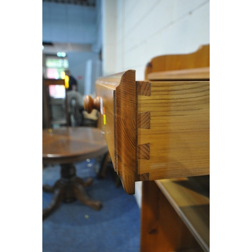 1291 - AN OPPOSING PAIR OF DUCAL PINE CABINETS, each with a single drawer, shelf and cupboard door, width 5... 