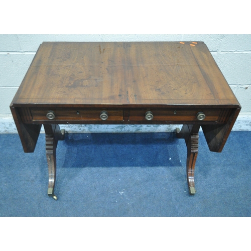 1292 - A GEORGIAN MAHOGANY DROP LEAF SOFA TABLE, with two frieze drawers, raised on twin supports and shape... 