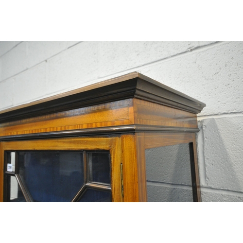 1295 - AN EDWARDIAN MAHOGANY DISPLAY CABINET, with double astragal glazed doors, that are enclosing two she... 