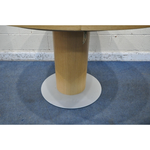 1297 - A MODERN SOLID OAK EXTENDING DINING TABLE, diameter 120cm x height 76cm (condition report: general s... 