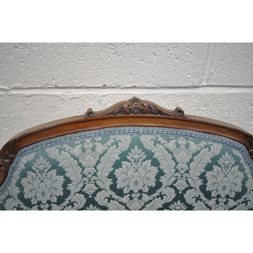 1298 - AN EDWARDIAN WALNUT THREE PIECE SUITE, with shaped foliate crests, splat backs, swept open armrests,... 