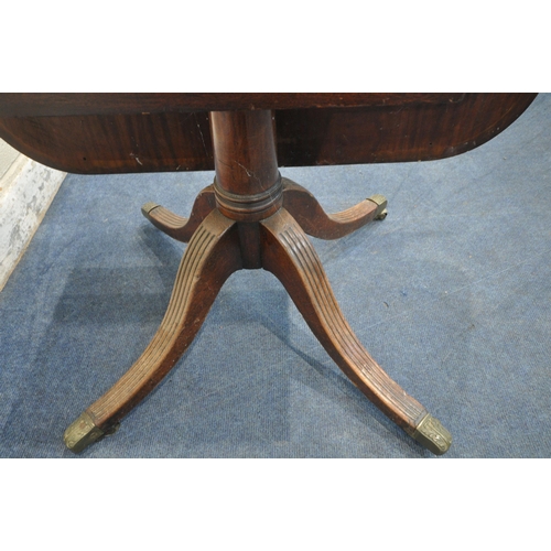 1302 - A MAHOGANY TILT TOP TABLE, raised on a single pedestal, with four splayed legs, width 130cm x depth ... 