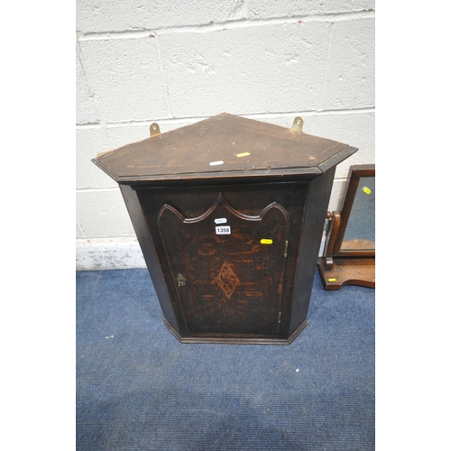 1358 - A SMALL GEORGIAN OAK HANGING CORNER CUPBOARD, along with a dressing table mirror (condition report: ... 