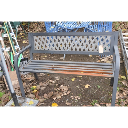 1013 - A PAIR OF MODERN METAL GARDEN BENCHES with lattice backs and slatted seats 120cm wide, along with a ... 