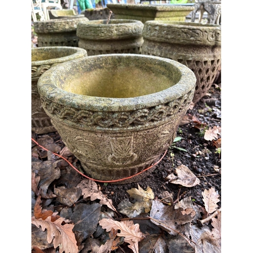 1016 - A SET OF FIVE WEATHERED COMPOSITE CIRCULAR PLANTERS, 34cm in diameter