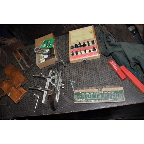 1059 - A BASKET AND A WOODEN BOX CONTAINING TOOLS including a Stanley No 50 plough plane with cutters, four... 