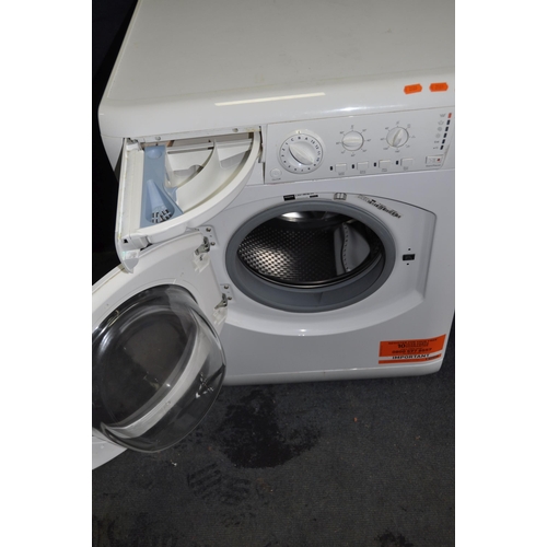 1068 - A HOTPOINT WDL520 WASHING MACHINE width 60cm depth 55cm height 84cm (PAT pass and working)