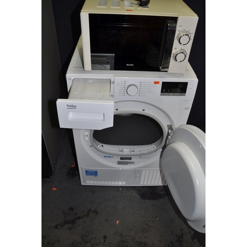 1073 - A BEKO DCX83100W CONDENSER DRYER width  60cm depth 60cm height 85cm and a Breville microwave (both P... 