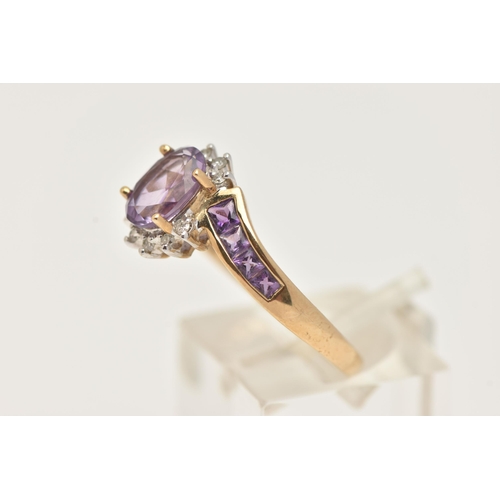 1 - A 9CT GOLD AMETHYST AND DIAMOND DRESS RING, set with a central oval cut amethyst, in a surround of s... 