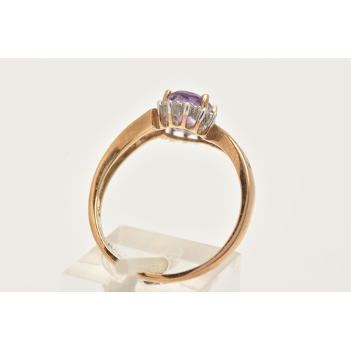 1 - A 9CT GOLD AMETHYST AND DIAMOND DRESS RING, set with a central oval cut amethyst, in a surround of s... 