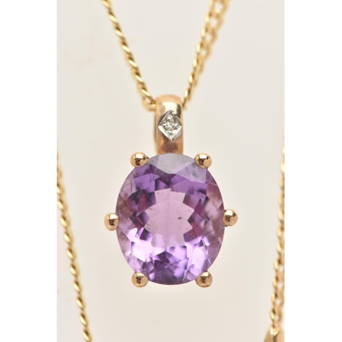 16 - A 9CT GOLD AMETHYST AND DIAMOND PENDANT WITH CHAIN, the pendant designed as an oval cut amethyst, in... 