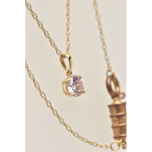 17 - A YELLOW METAL PENDANT NECKLACE, the pendant set with a circular cut pink cubic zirconia, in a four ... 