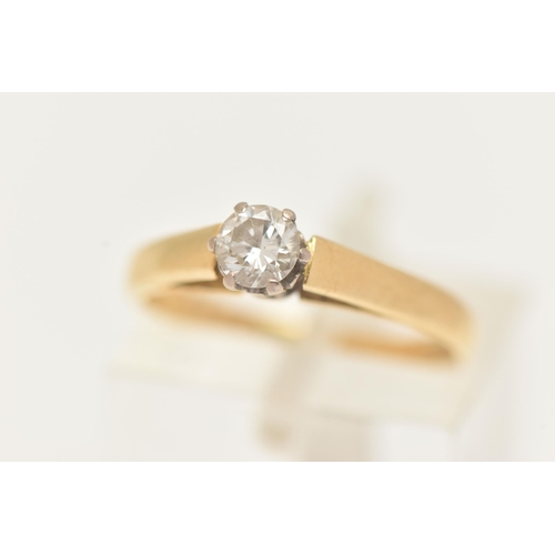 23 - AN 18CT GOLD DIAMOND SINGLE STONE RING, set with a round brilliant cut diamond, six claw setting (on... 