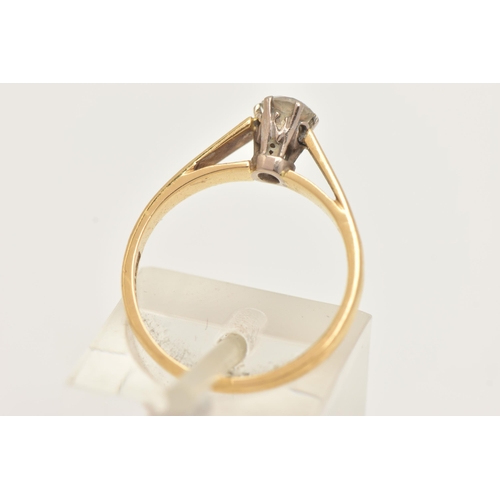 23 - AN 18CT GOLD DIAMOND SINGLE STONE RING, set with a round brilliant cut diamond, six claw setting (on... 