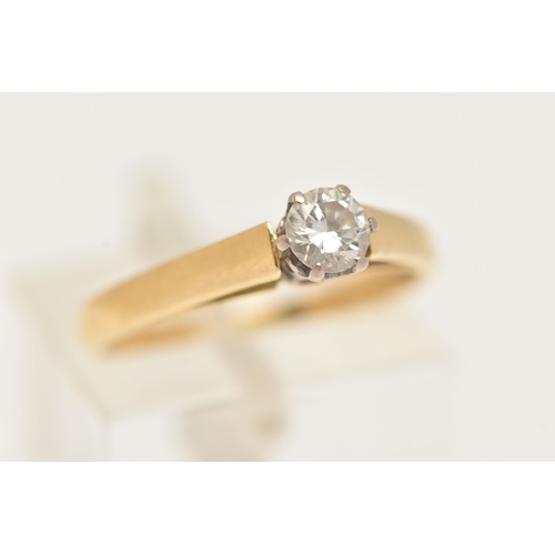 23 - AN 18CT GOLD DIAMOND SINGLE STONE RING, set with a round brilliant cut diamond, six claw setting (on... 