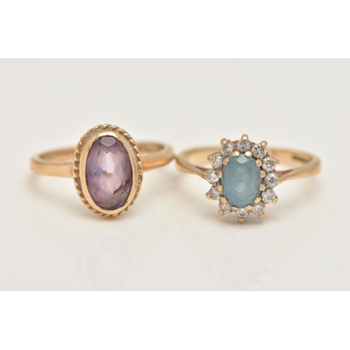 27 - TWO 9CT GOLD GEM SET RINGS, the first set with an oval cut amethyst, collet set with a fine rope twi... 