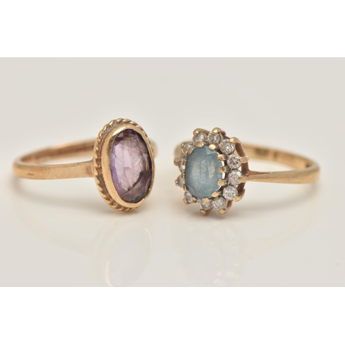 27 - TWO 9CT GOLD GEM SET RINGS, the first set with an oval cut amethyst, collet set with a fine rope twi... 