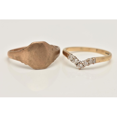 28 - TWO 9CT GOLD RINGS, the first a wish bone ring set with colourless cubic zirconia, polished band, ha... 