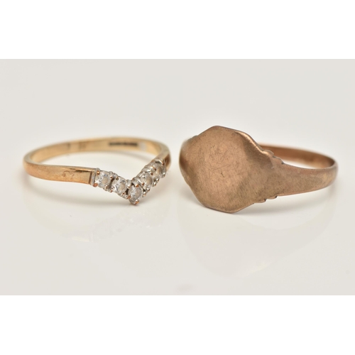 28 - TWO 9CT GOLD RINGS, the first a wish bone ring set with colourless cubic zirconia, polished band, ha... 