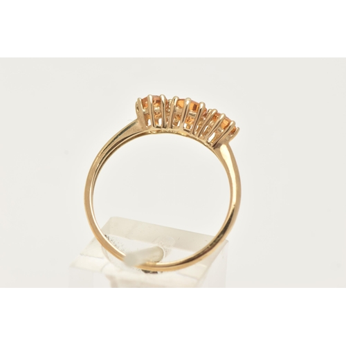 3 - A 9CT GOLD CITRINE RING, set with three circular cut citrines, each in a claw setting, leading onto ... 