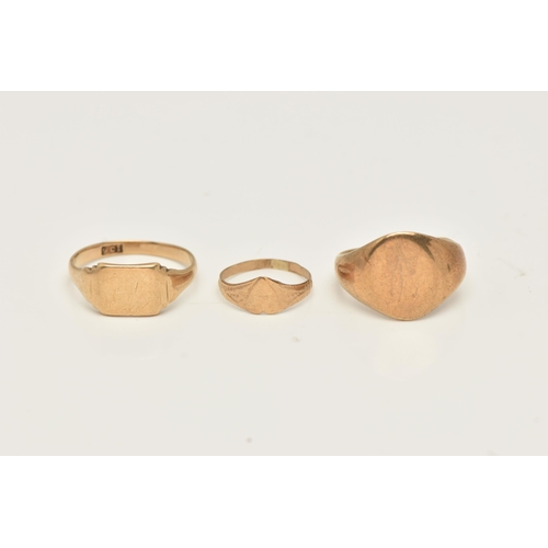 37 - THREE SIGNET RINGS, to include an oval shape signet ring with initial monogram, hallmarked 9ct gold ... 