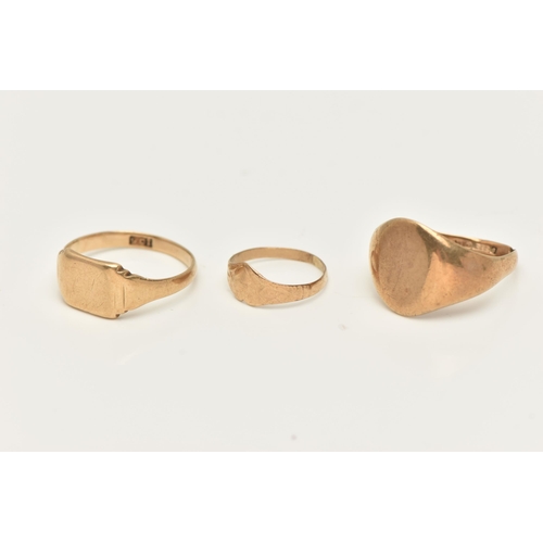 37 - THREE SIGNET RINGS, to include an oval shape signet ring with initial monogram, hallmarked 9ct gold ... 