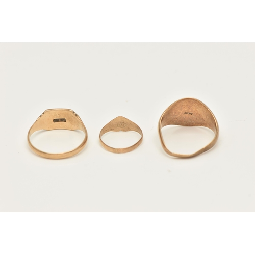 37 - THREE SIGNET RINGS, to include an oval shape signet ring with initial monogram, hallmarked 9ct gold ... 