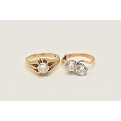 47 - TWO YELLOW METAL RINGS, to include a cubic zirconia single stone ring within an extended eight claw ... 