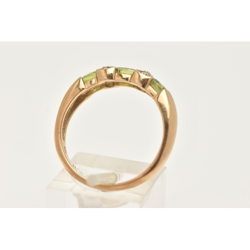 5 - A 9CT GOLD PERIDOT AND DIAMOND DRESS RING, set with three oval cut peridots with single cut diamond ... 