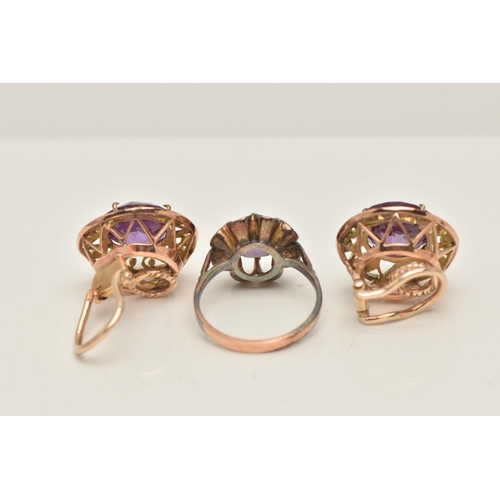 52 - A SYNTHETIC COLOUR CHANGE CORUNDUM RING AND EARRINGS, the ring set with a circular shape synthetic c... 