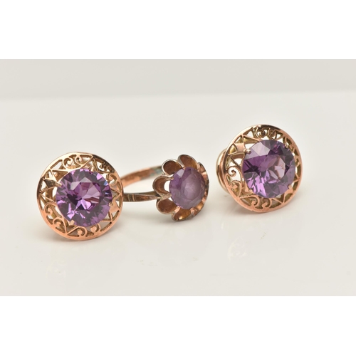 52 - A SYNTHETIC COLOUR CHANGE CORUNDUM RING AND EARRINGS, the ring set with a circular shape synthetic c... 