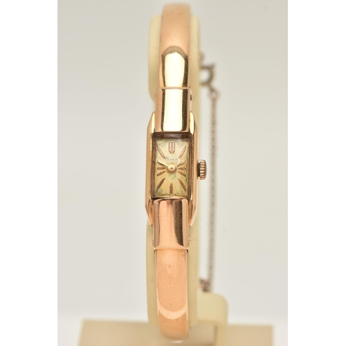 56 - A RETRO REIMAR WRISTWATCH, the rectangular cream dial, with gilt hourly applied markers, plain polis... 