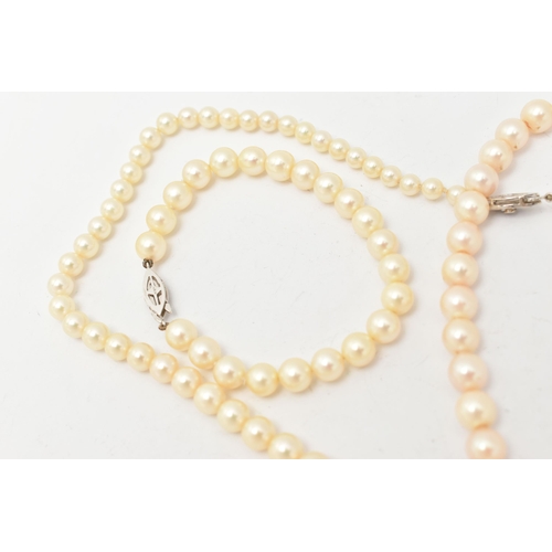 69 - A COLLECTION OF CULTURED PEARL JEWELLERY WITH 9CT WHITE GOLD AND WHITE METAL CLASPS, to include a gr... 