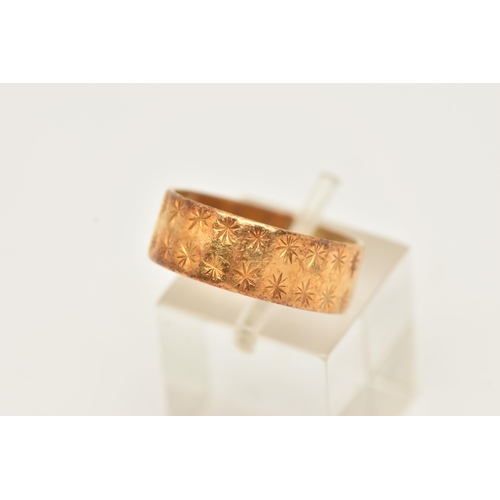 73 - A 22CT GOLD WIDE BAND RING, AF split band with diamond cut pattern, hallmarked 22ct London 1970, app... 