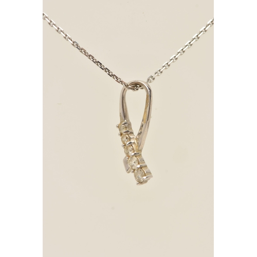 79 - A WHITE METAL DIAMOND SET PENDANT WITH A 9CT WHITE GOLD CHAIN, the ribbon pendant set with five grad... 