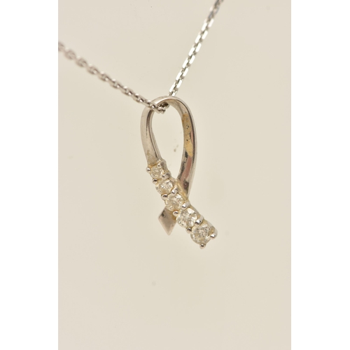 79 - A WHITE METAL DIAMOND SET PENDANT WITH A 9CT WHITE GOLD CHAIN, the ribbon pendant set with five grad... 