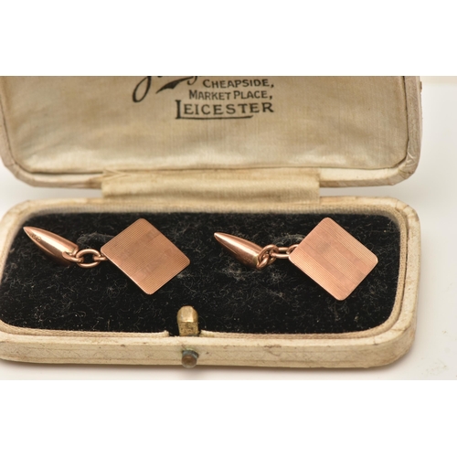 80 - A PAIR OF 9CT ROSE GOLD CUFFLINKS, chain linked with an engine turned pattern square panel and toggl... 