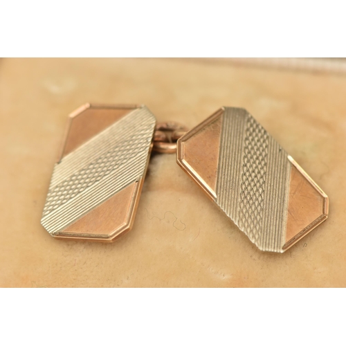 81 - A PAIR OF 9CT GOLD BI COLOUR CUFFLINKS, chain linked with two rectangular engine turned pattern pane... 