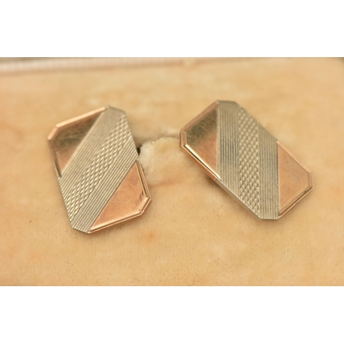 81 - A PAIR OF 9CT GOLD BI COLOUR CUFFLINKS, chain linked with two rectangular engine turned pattern pane... 