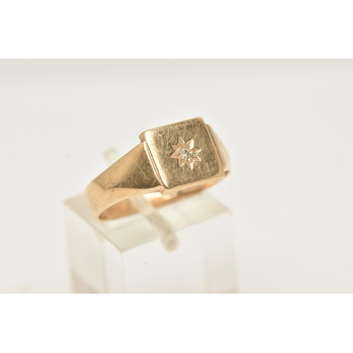 85 - A GENTS 9CT GOLD DIAMOND SET SIGNET RING, square signet with a star set round brilliant cut diamond,... 