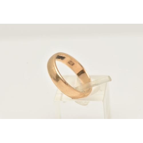 86 - A 9CT GOLD POLISHED BAND RING, approximate band width 4.1mm, hallmarked 9ct London, approximate gros... 