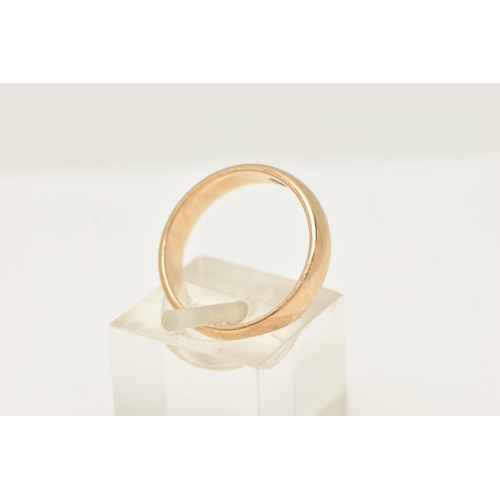 86 - A 9CT GOLD POLISHED BAND RING, approximate band width 4.1mm, hallmarked 9ct London, approximate gros... 