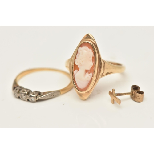 87 - A 9CT GOLD CAMEO RING AND A YELLOW METAL THREE STONE RING, the carved shell cameo in a marquise coll... 