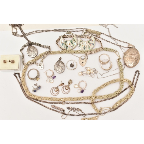 101 - AN ASSORTMENT OF WHITE METAL JEWELLERY, to include a large silver foliate pattern locket, hallmarked... 