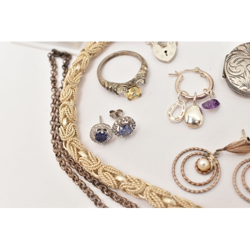 101 - AN ASSORTMENT OF WHITE METAL JEWELLERY, to include a large silver foliate pattern locket, hallmarked... 