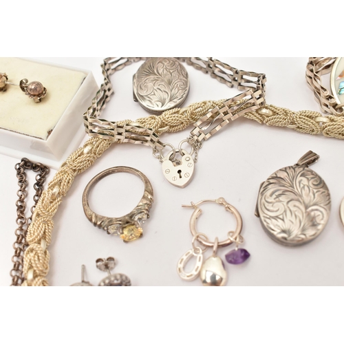 101 - AN ASSORTMENT OF WHITE METAL JEWELLERY, to include a large silver foliate pattern locket, hallmarked... 