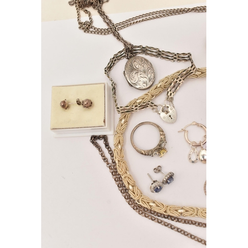 101 - AN ASSORTMENT OF WHITE METAL JEWELLERY, to include a large silver foliate pattern locket, hallmarked... 