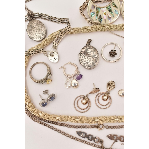 101 - AN ASSORTMENT OF WHITE METAL JEWELLERY, to include a large silver foliate pattern locket, hallmarked... 